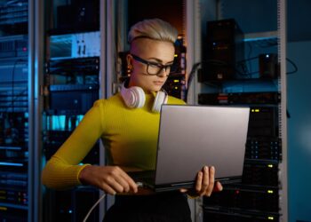 it woman connecting internet network cable to lapt 2023 11 27 05 22 20 utc